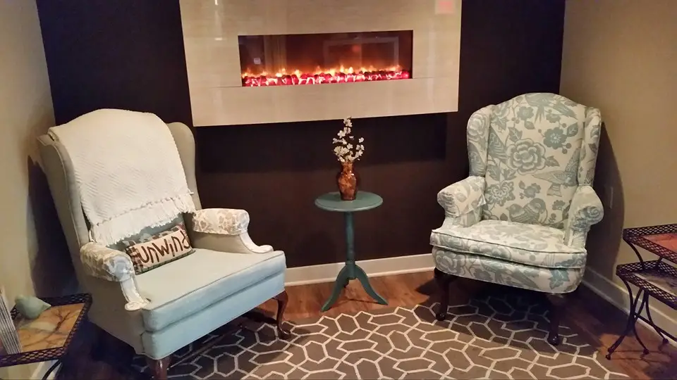 Wait in this cozy room before your massage